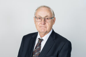 Dr. Alan Bollard